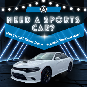 White dodge challenger on black background with the words for Need a Sports car? at STLCarZ 