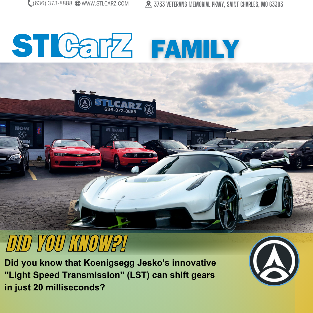 Promotional graphic for STLCarZ Family featuring an image of their dealership with a variety of cars parked in front, including two red sports cars and a prominent silver Koenigsegg Jesko in the forefront. Text overlay reads: '(636) 373-8888 | www.STLCARZ.com | 3733 Veterans Memorial Pkwy, Saint Charles, MO 63303' at the top, and 'DID YOU KNOW? Did you know that Koenigsegg Jesko's innovative "Light Speed Transmission" (LST) can shift gears in just 20 milliseconds?' with the STLCarZ logo at the bottom.