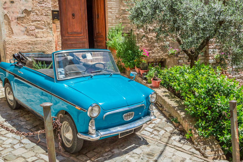 Vintage car on a beautiful street in Italy