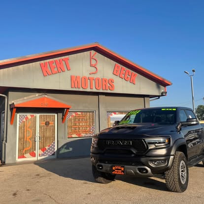 Black RAM truck parked in front of Kent Beck Motors, ready for a customer to schedule a test drive in Abilene.