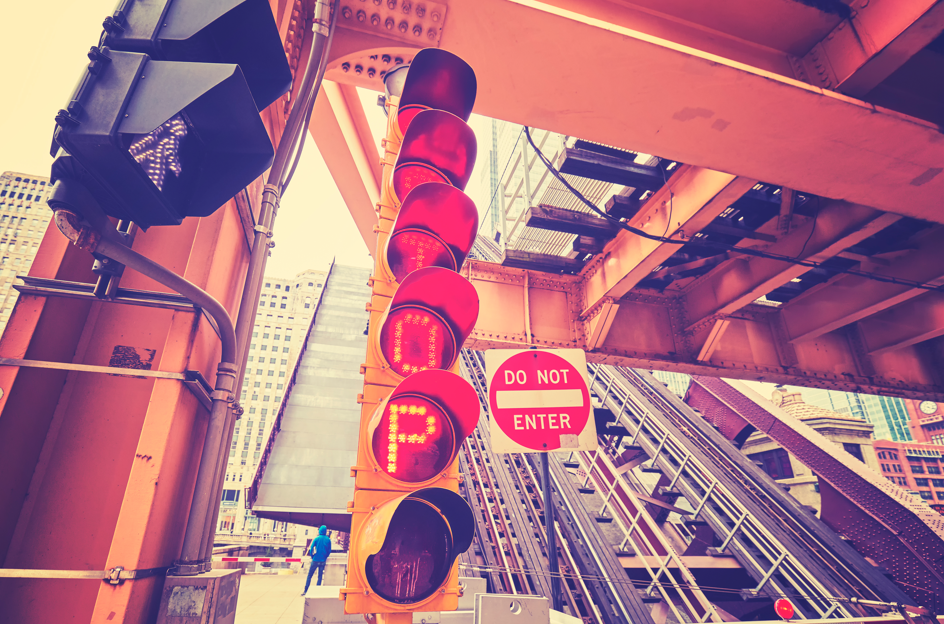 Stop light spelling out S-T-O-P