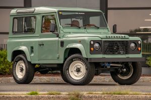 Restored seafoam green Land Rover Defender 90