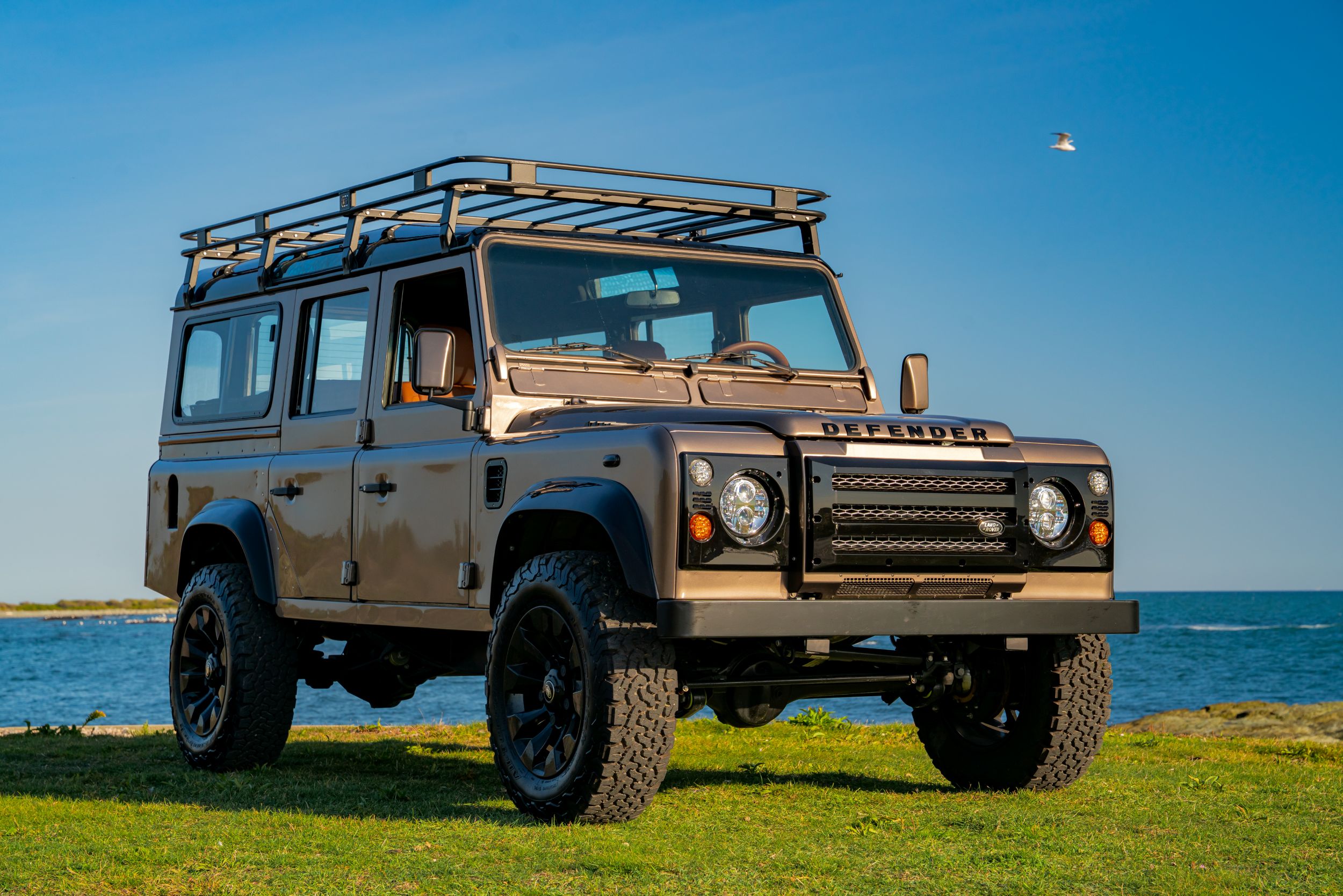 Vantage Auto Custom Defender 110 Restored Land Rover Defender 90 with tan leather interior by Vantage Auto
