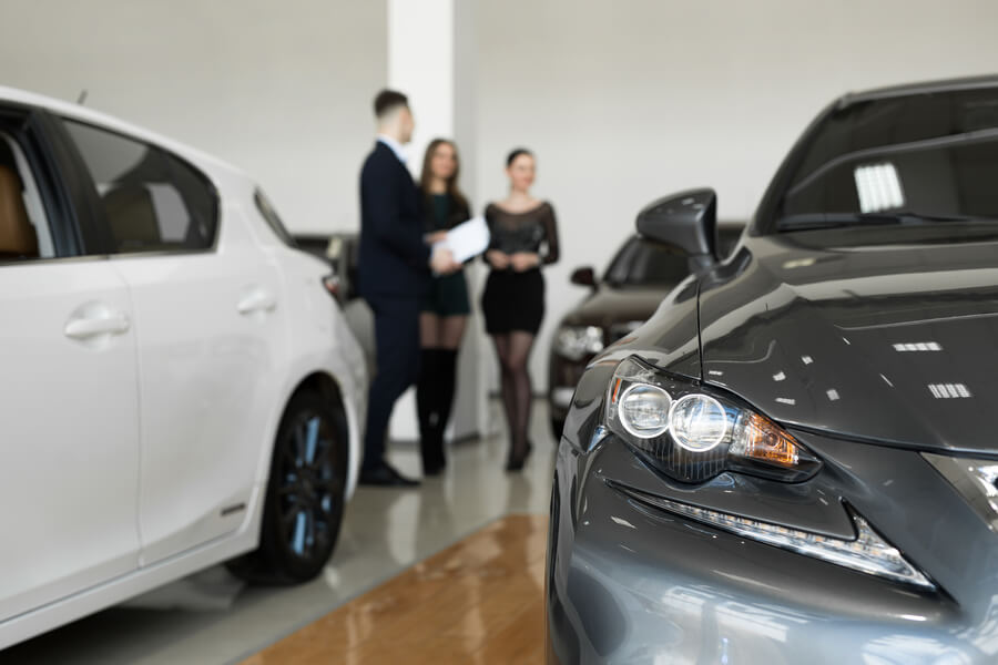 Income taxes florida - Cars displayed inside a modern showroom.
