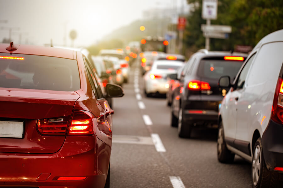Is income tax refund considered income - Cars stopped in traffic on a city street.