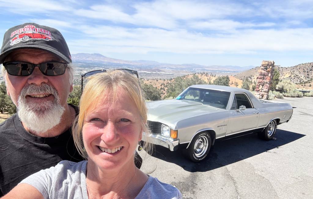 Robin and Glenn in front of El Camino Glenn and Robin, owners of Old Iron Motors, Inc. in front of El Camino above Reno, NV