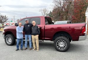 Customer purchasing a used vehicle from Monticello Motors in Charlottesville