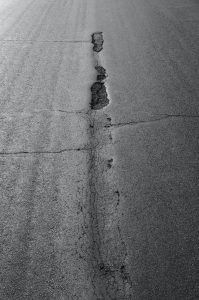 Why Avoiding Potholes is Essential for Every Driver