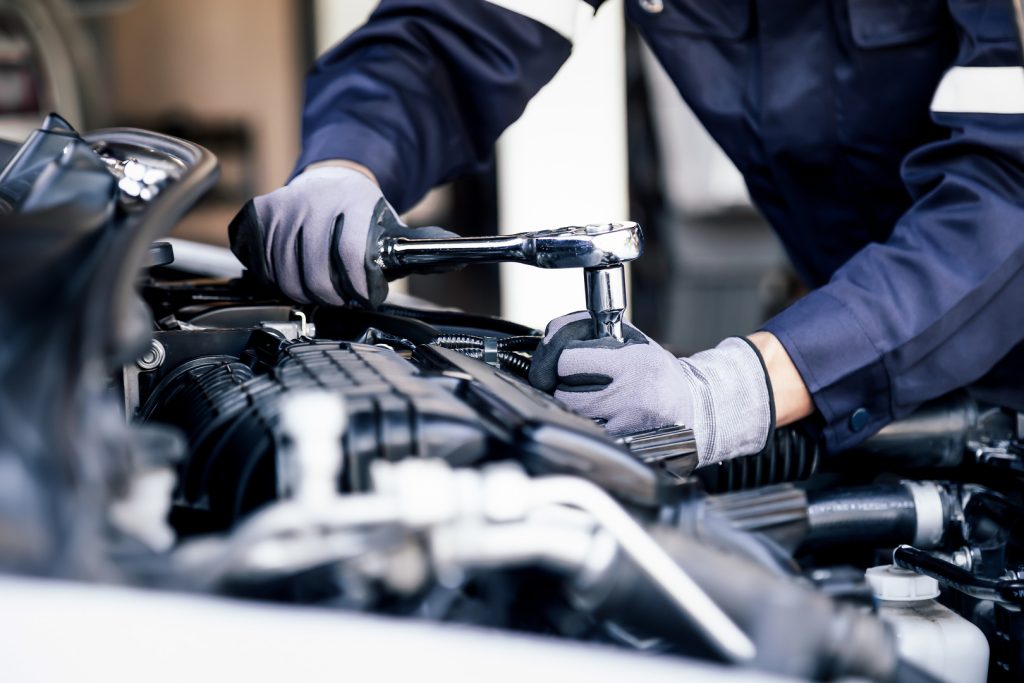 Mechanic performing work at 916 Auto Mart’s on-site service department, providing thorough maintenance and repair services for used cars.