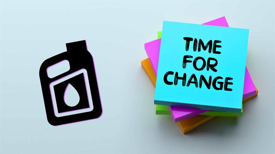 sticky notes that say time for change next to a sticker of a motor oil jug