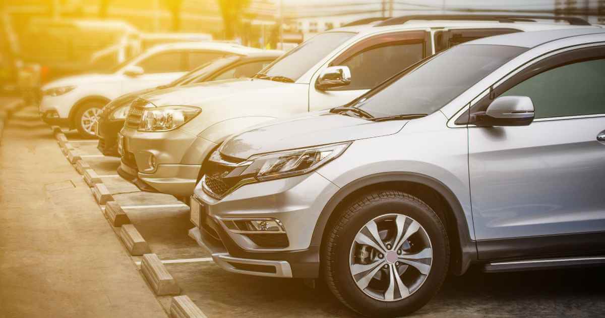 a row of cars at a car dealership fresno has available