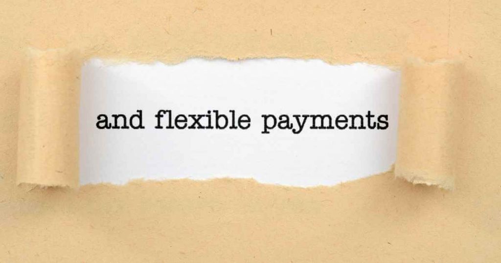 an image of a piece of paper that is torn and another paper underneath that reads "and flexible payments"
