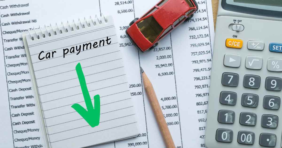 a note pad with the words "car payment" and an arrow pointing down showing how you can reduce the average car payment for used cars