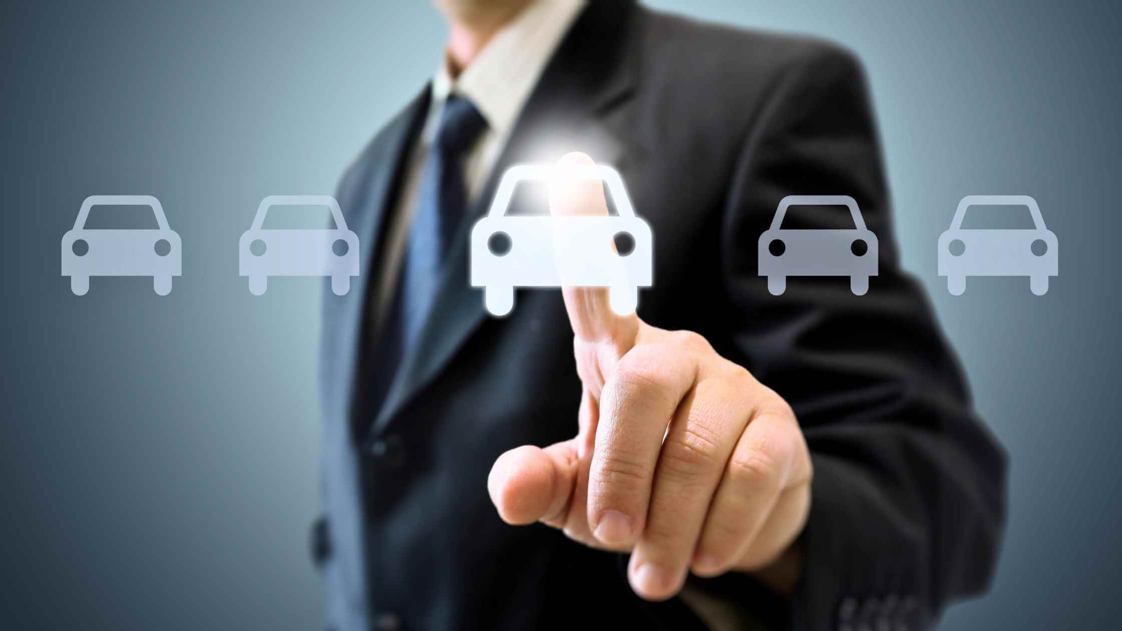 a photo of a man in a suit touching a glowing car emoji that has many other around it depicting car financing options