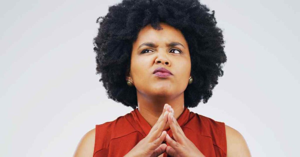 a photo of a woman pondering her car loans