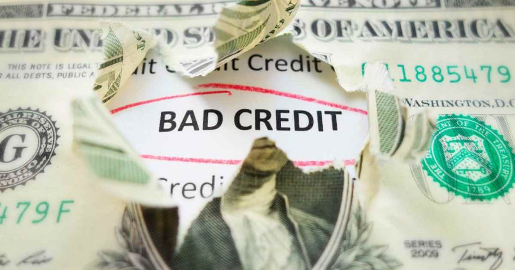 a picture of a dollar bill hiding the words bad credit underneath where you find bad credit car loans