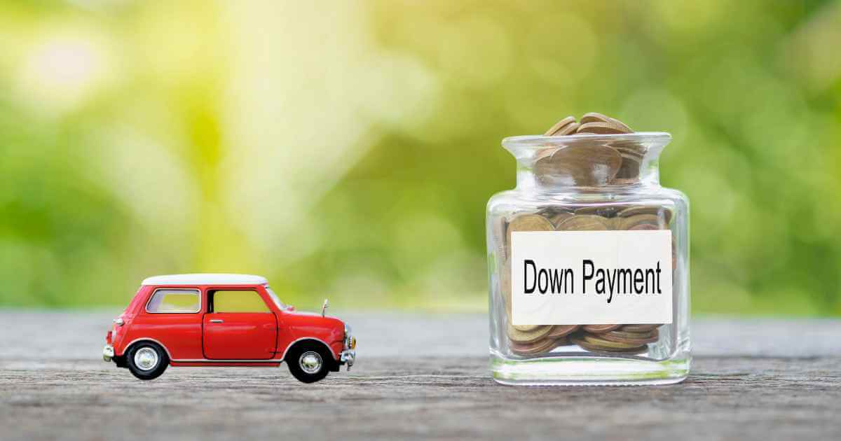 a photo of a toy car next to a see through jar that reads "down payment" showing how to save up a good down payment for a car