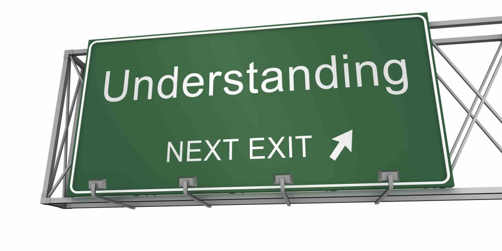 a freeway sign that reads "understanding next exit"