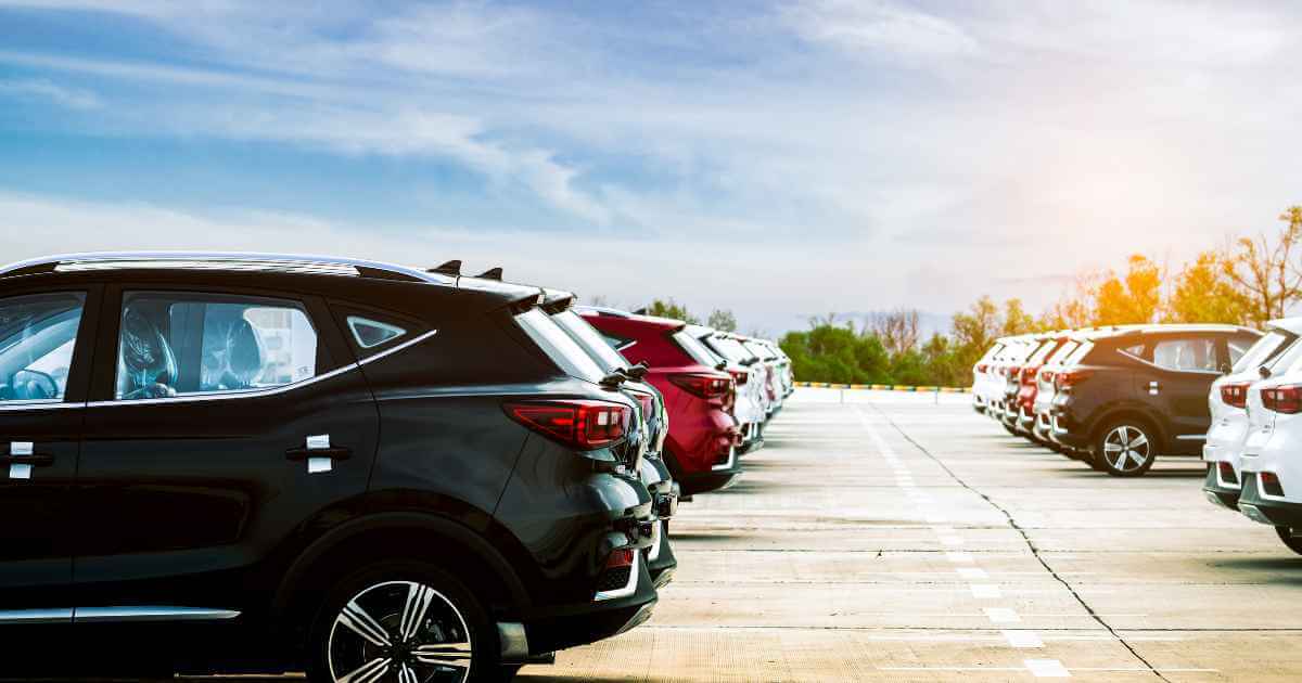 a row of beautiful cars on a sunny day at one of our Fresno car lots