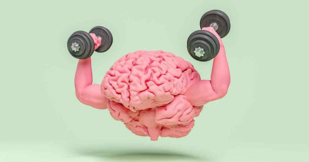 a brain with a set of arms lifting dumbbells showing it is now armed to take on the car financing journey