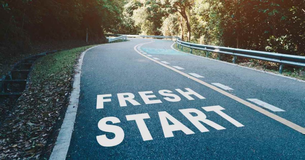 a road with the words "fresh start" on it