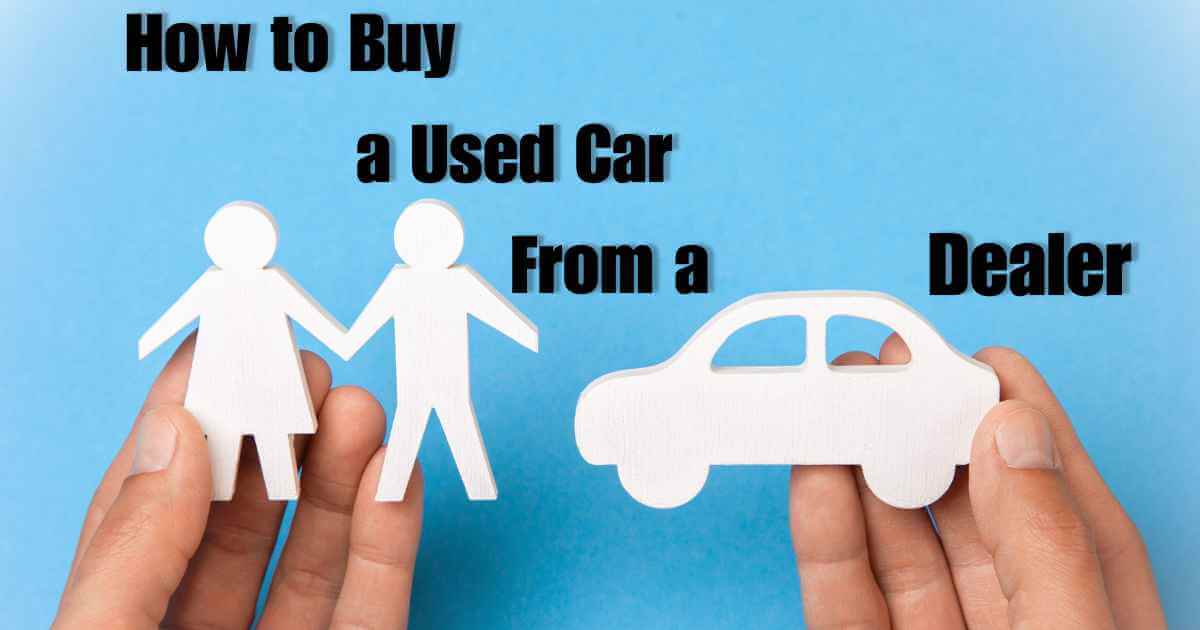 hands holding cutouts of people and a car with the words how to buy a used car from a dealer on it