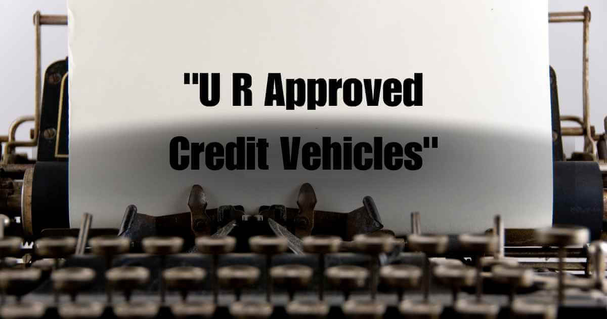 a typewriter with the words U R Approved Credit Vehicles
