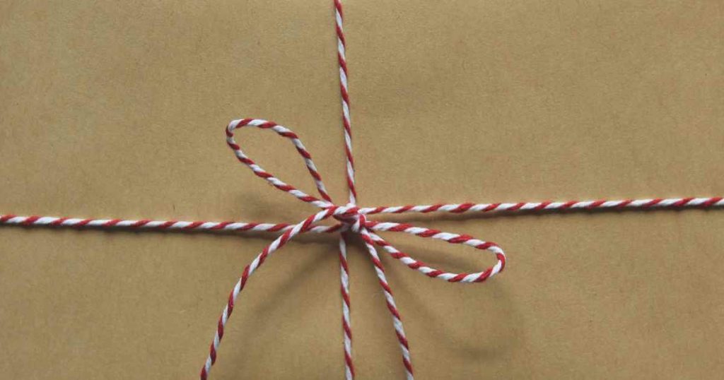 a gift that is neatly wrapped with a string