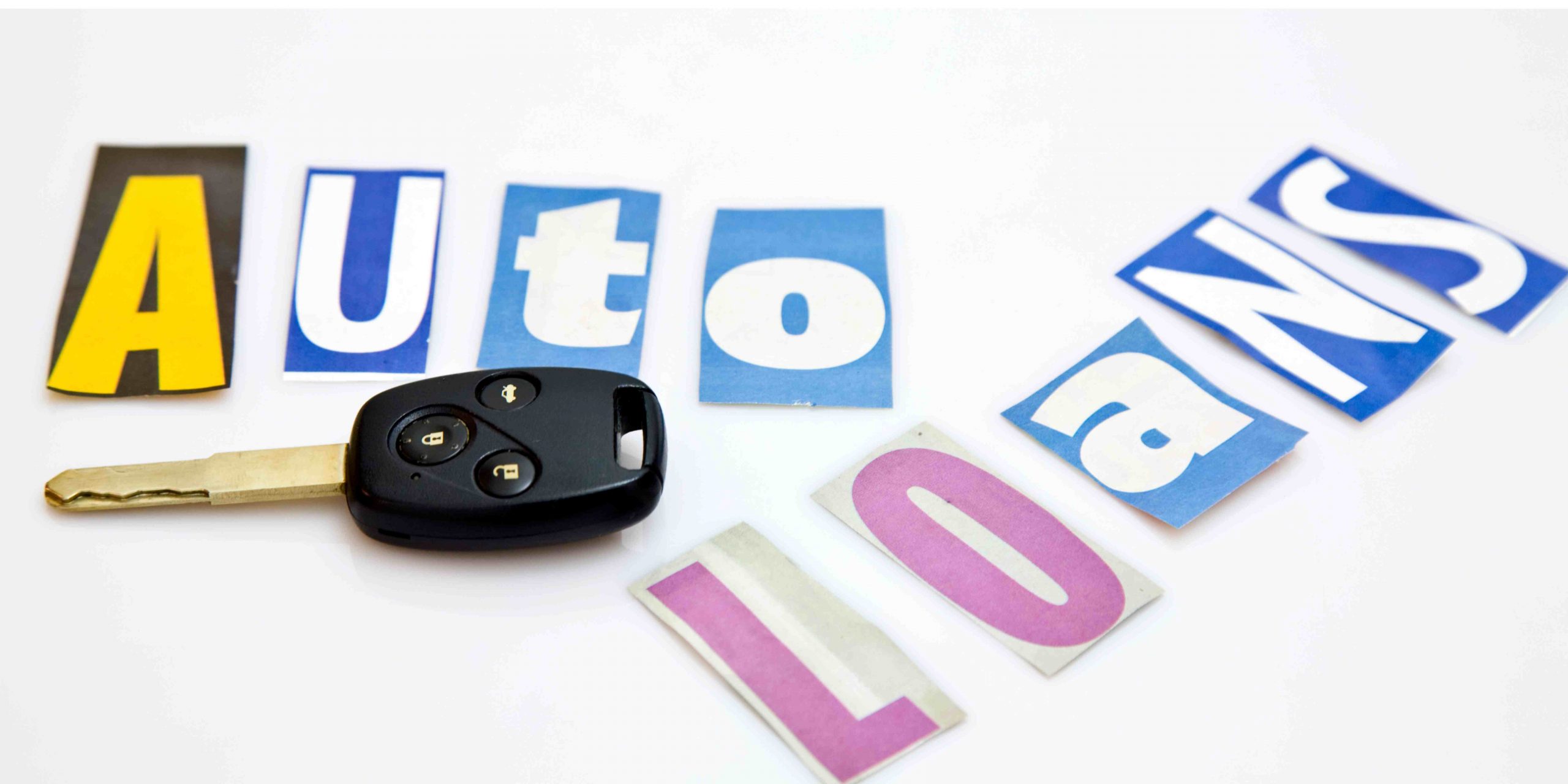 a cutout of letters with a car key to signify the ease of getting an auto loans with wastland