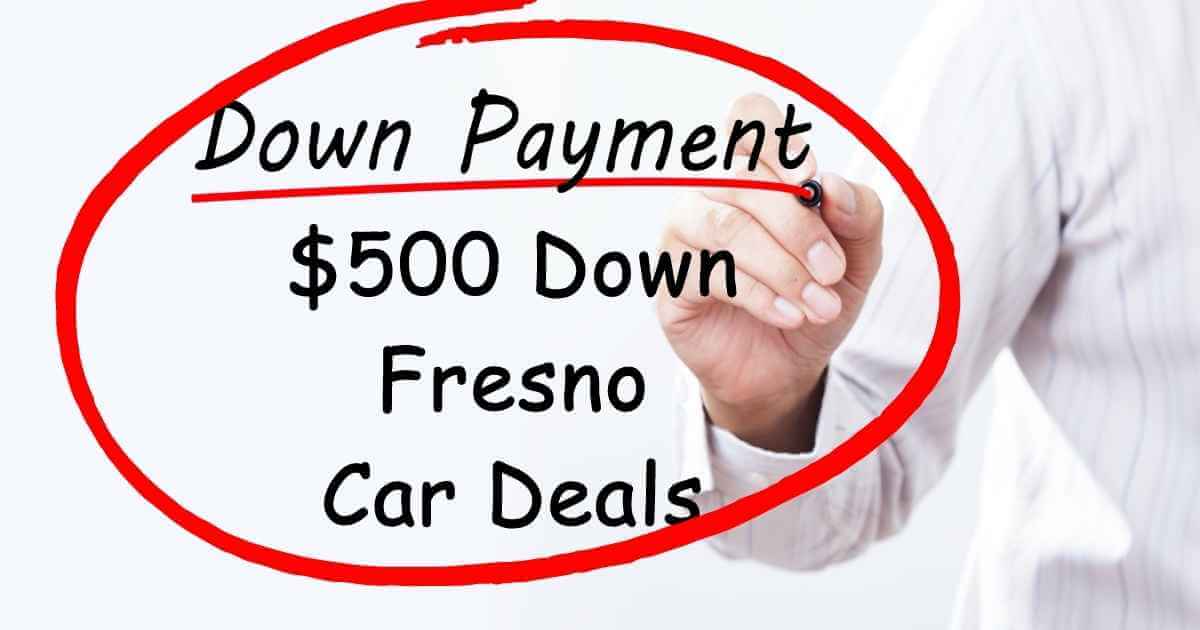 a see-through board that reads down payment 500 down Fresno Car Deals