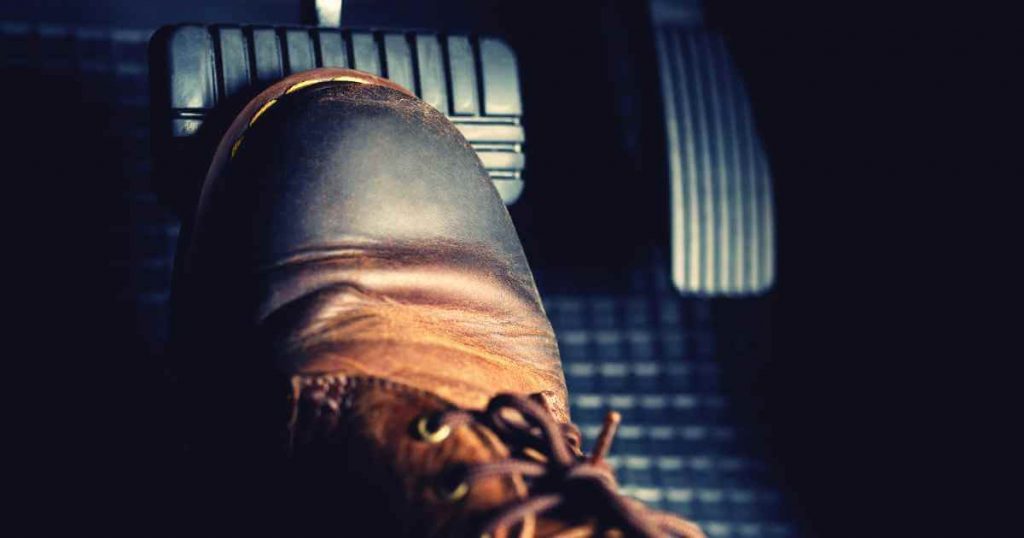 a boot over car pedals suggesting you should take a trip down to your local low down payment no credit check car dealer