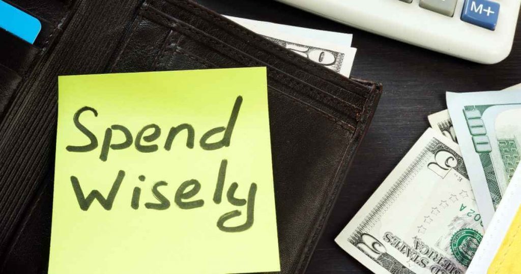 a sticky note that says spend wisely with money around it showing how to save money on your car purchase