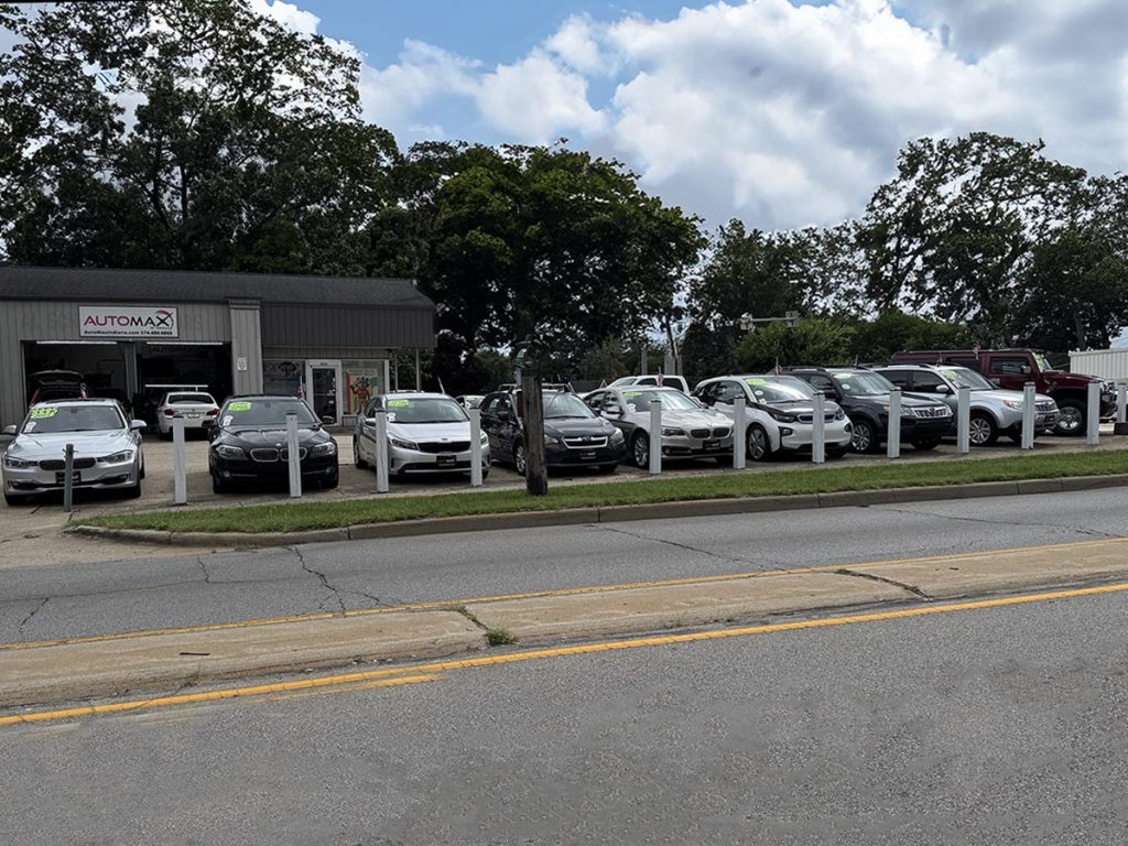 Lineup of used cars for sale at Automax dealership in Mishawaka.