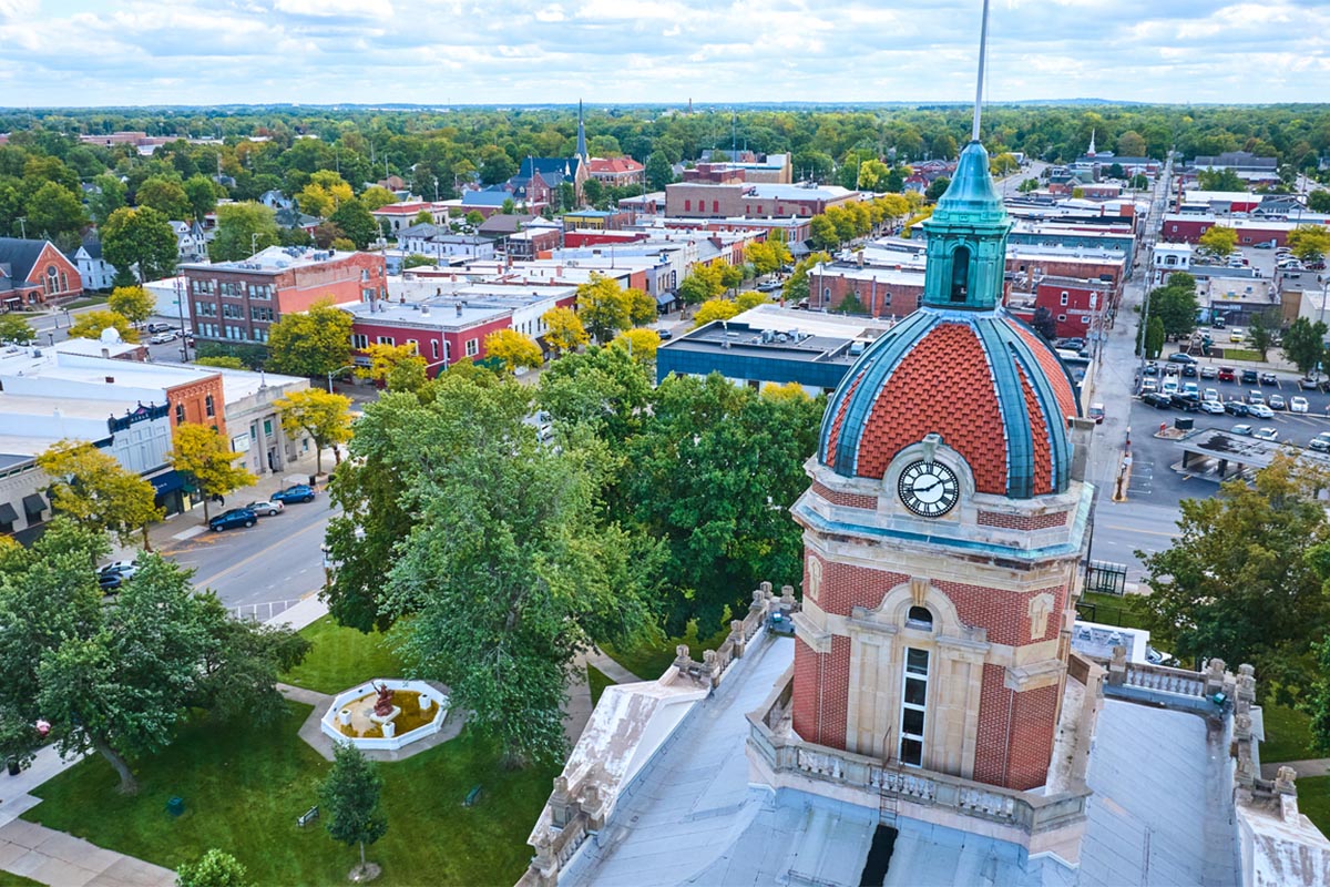 Historic clock tower and streetscape in Michiana near Automax of Indiana car dealership