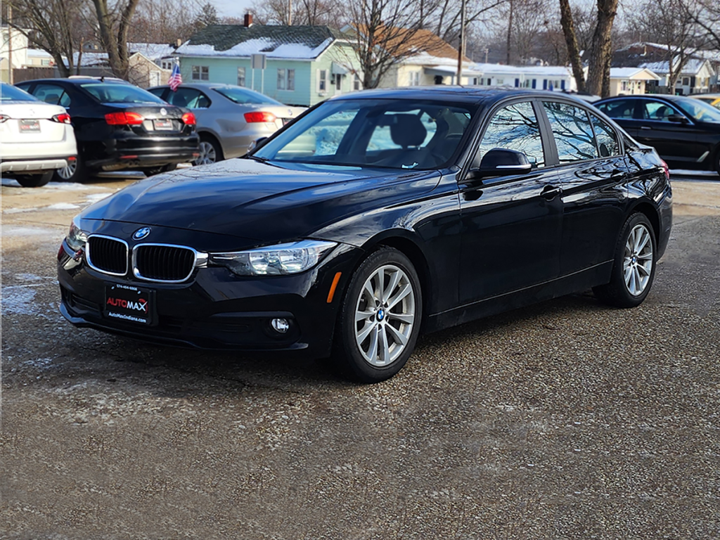 2016 BMW 320i sedan shown in a front three-quarter view on the Automax of Indiana lot in Mishawaka, Indiana.