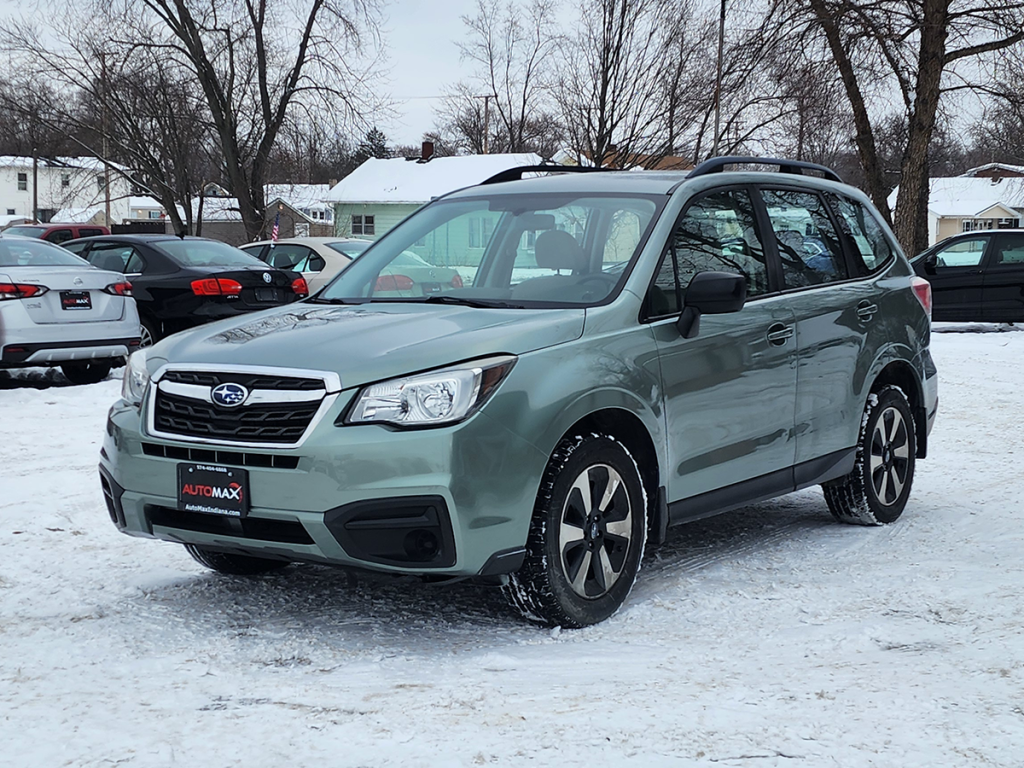 2017 Subaru Forester shown in a front three-quarter view on a snowy lot at Automax of Indiana in Mishawaka, Indiana.