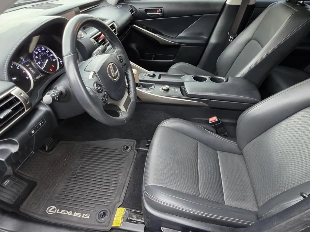 2015 Lexus IS 250 Sedan driving near Mobile Alabama showcasing luxury design for sale near me