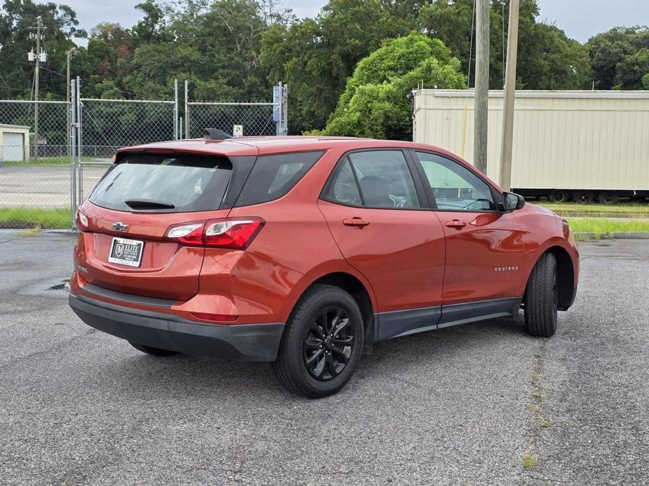 2020 Chevrolet Equinox LS SUV driving near Mobile Alabama showcasing modern design