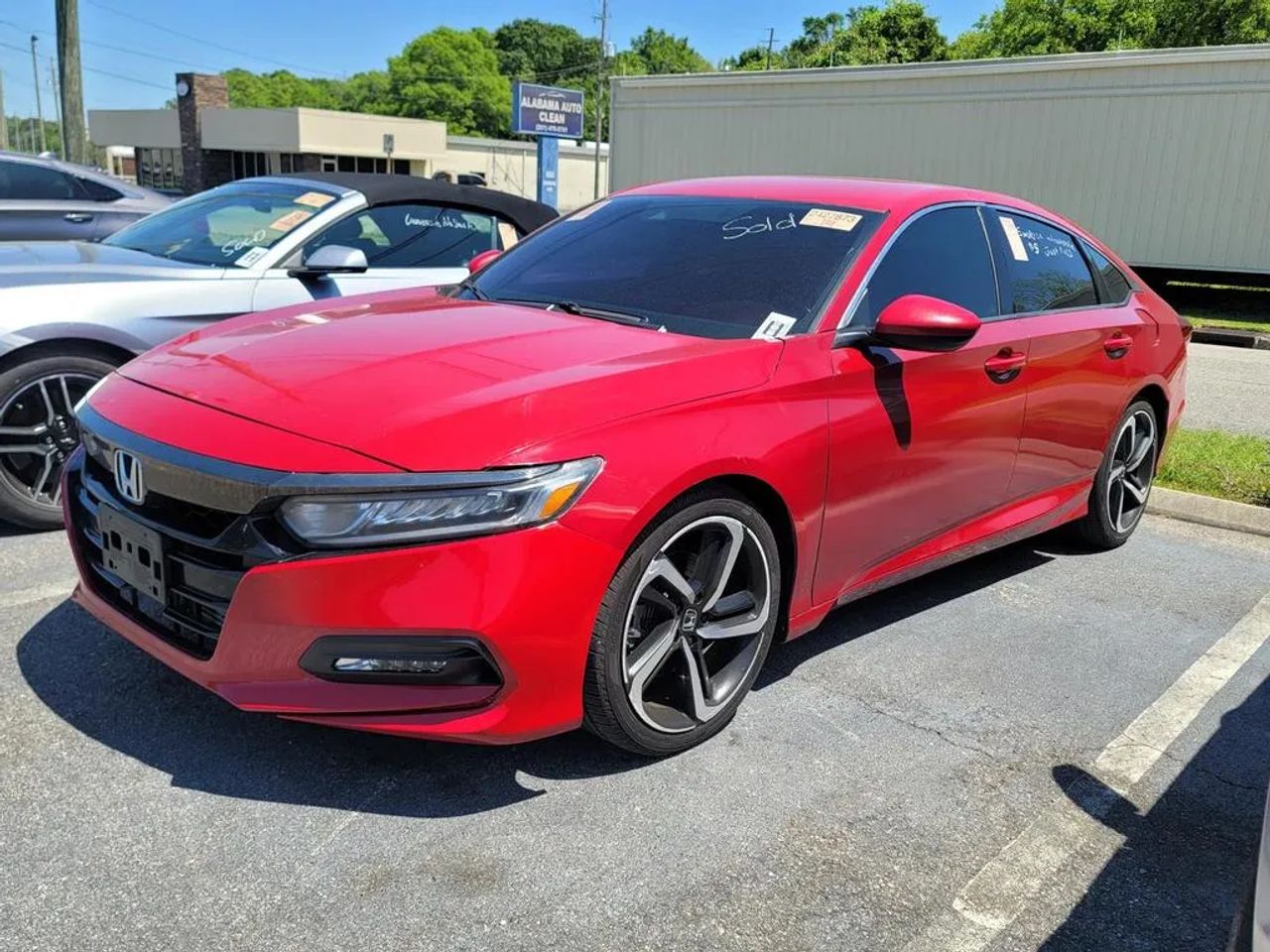 2020 Honda Accord Sport Sedan 4D in red displayed at Elite Motors Mobile Alabama used cars for sale near me