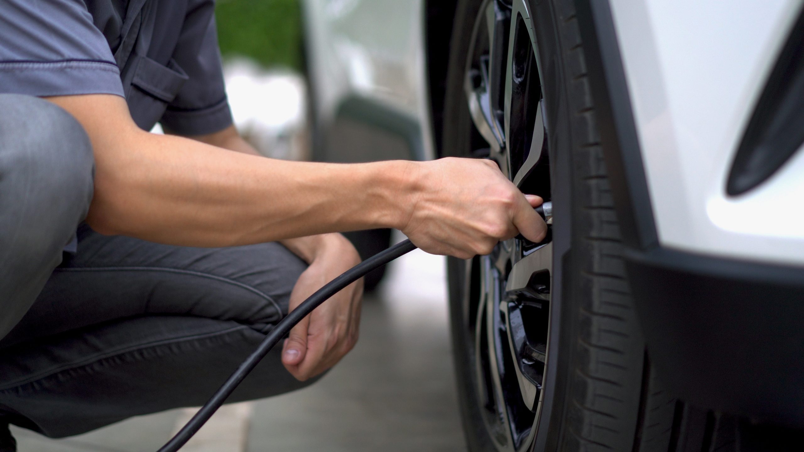 hand-checking-tire-pressure